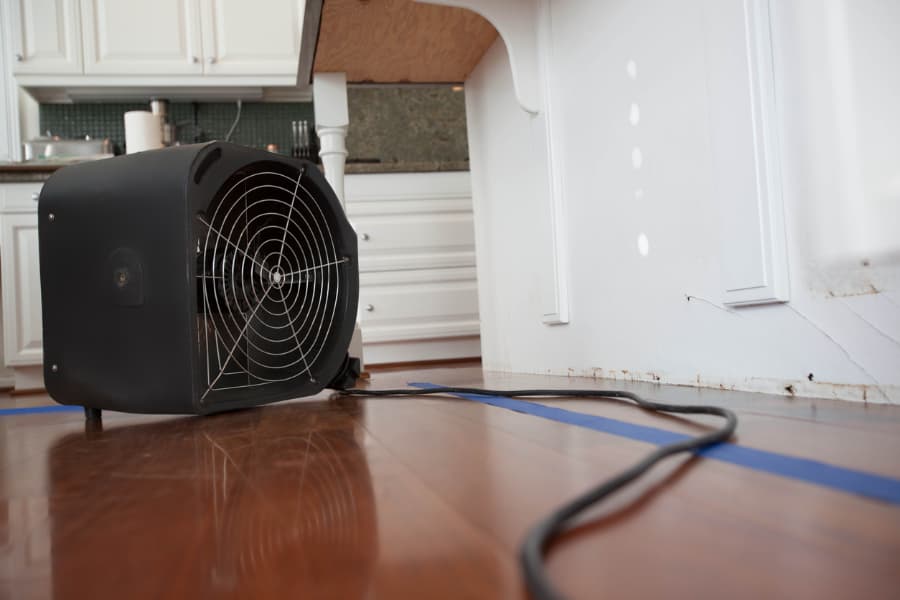 Fan drying water damaged floors