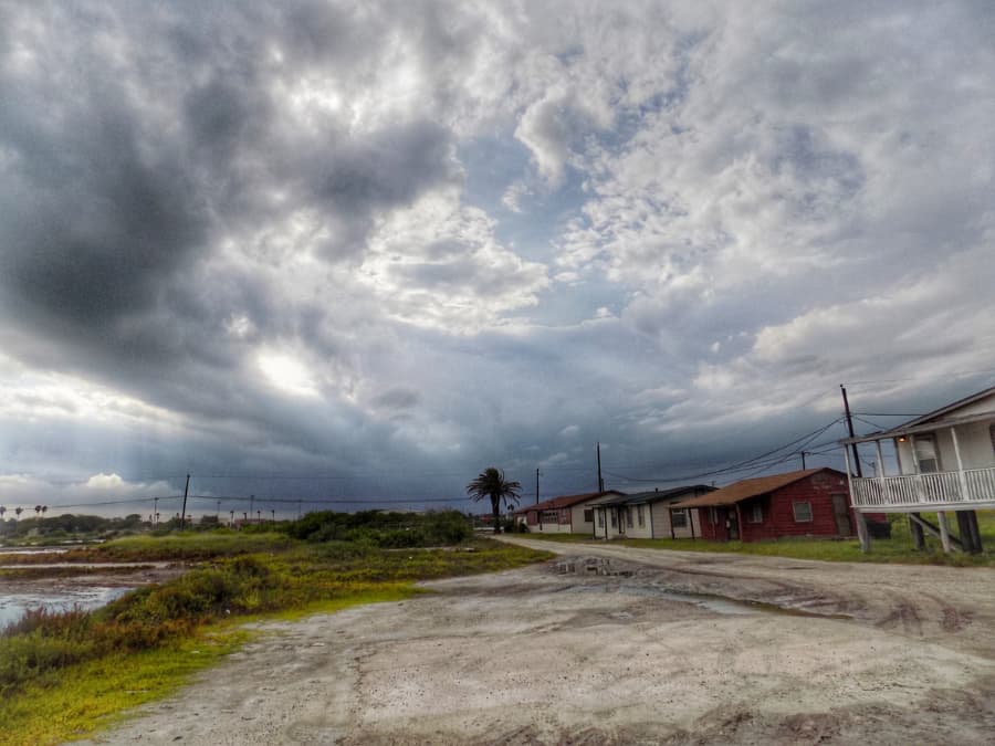 Storm Clouds Over Houses