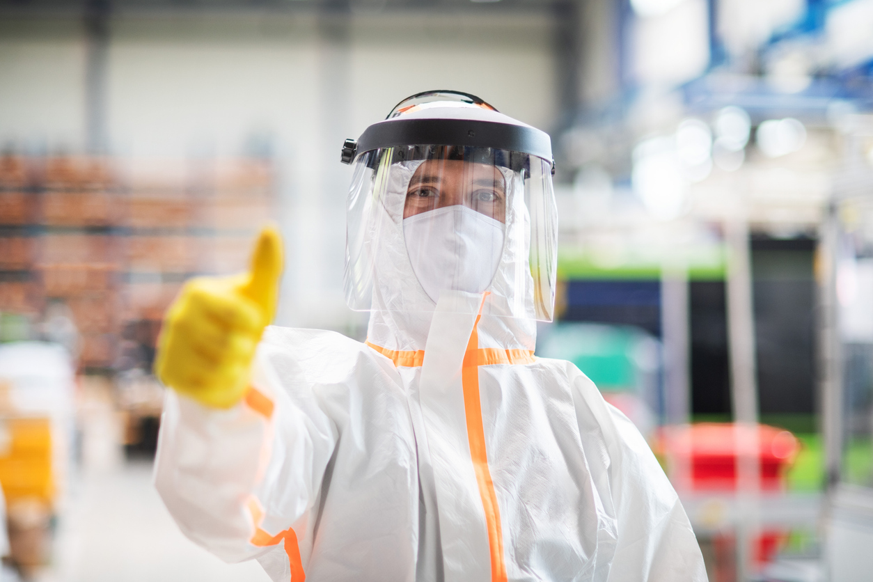 Cleaning Professional In Protective Suit.