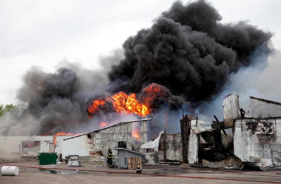 Building engulfed in smoke and fire